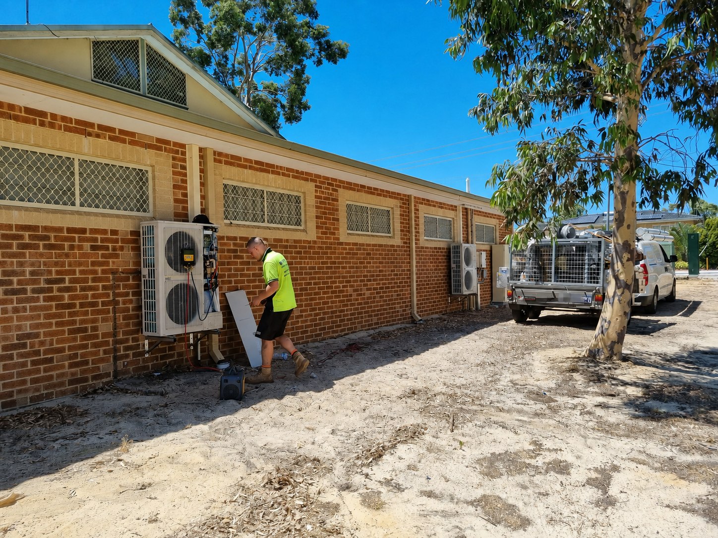 Illustrative air-conditioning service scene at a Perth property